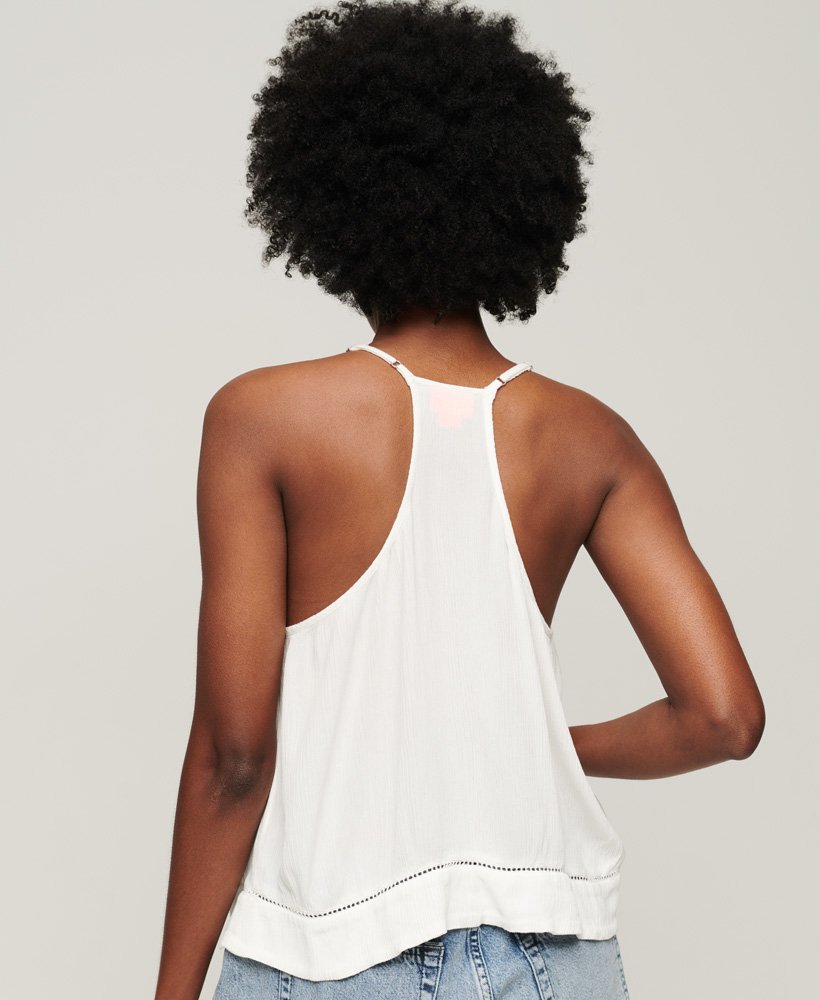 cami top met strik in de hals in gebroken wit.