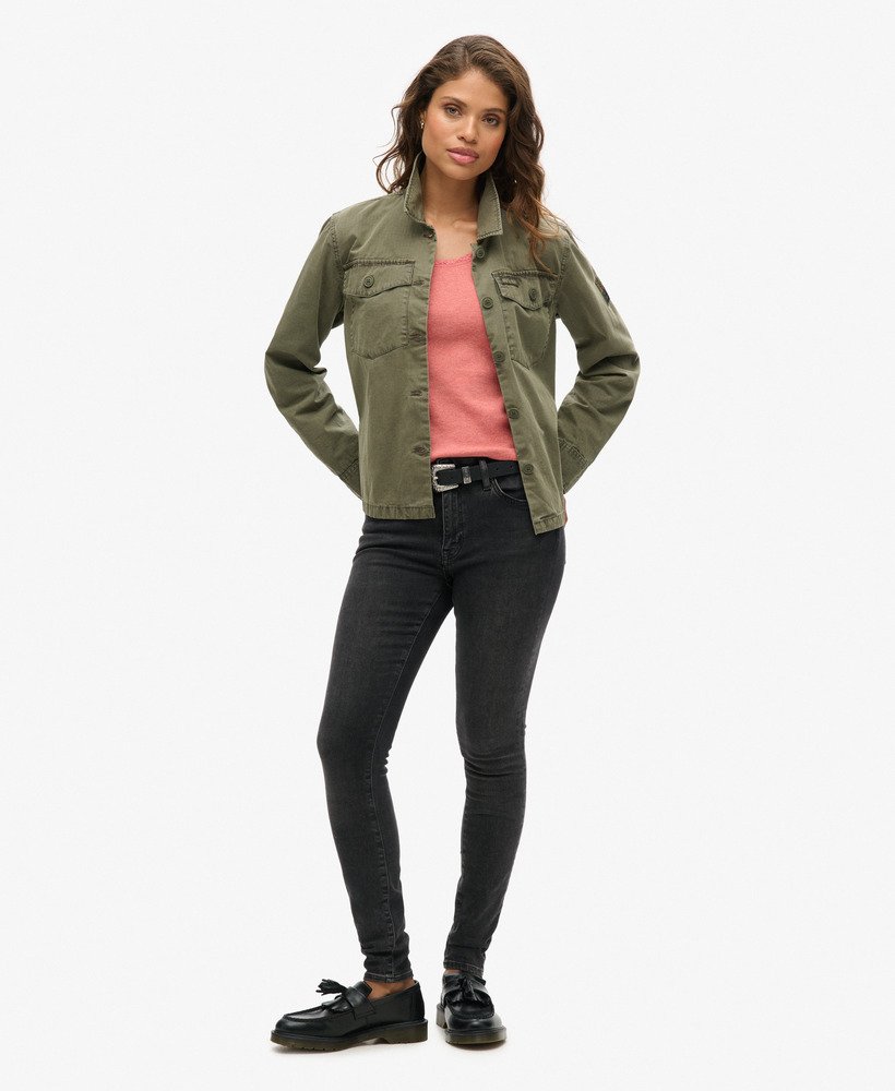 athletic essentials vesttop met kanten afwerking in koraalroze.