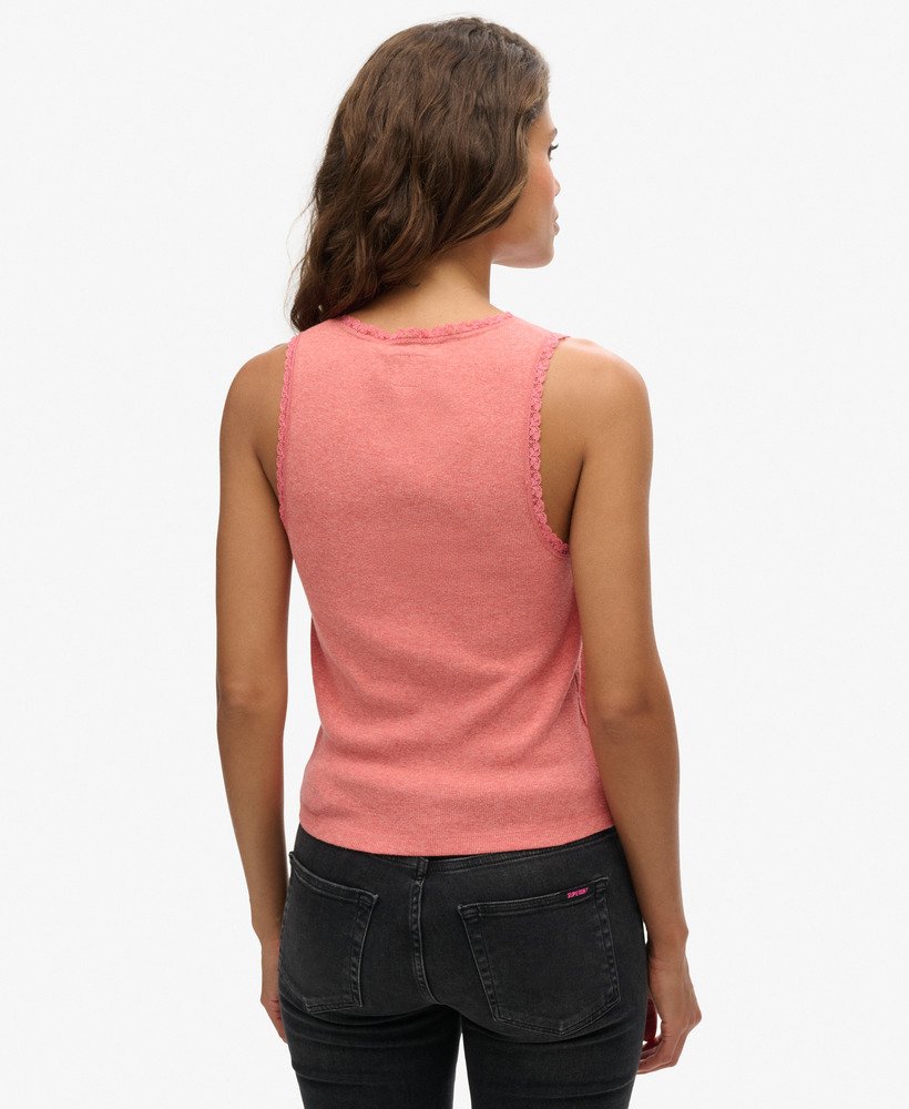 athletic essentials vesttop met kanten afwerking in koraalroze.