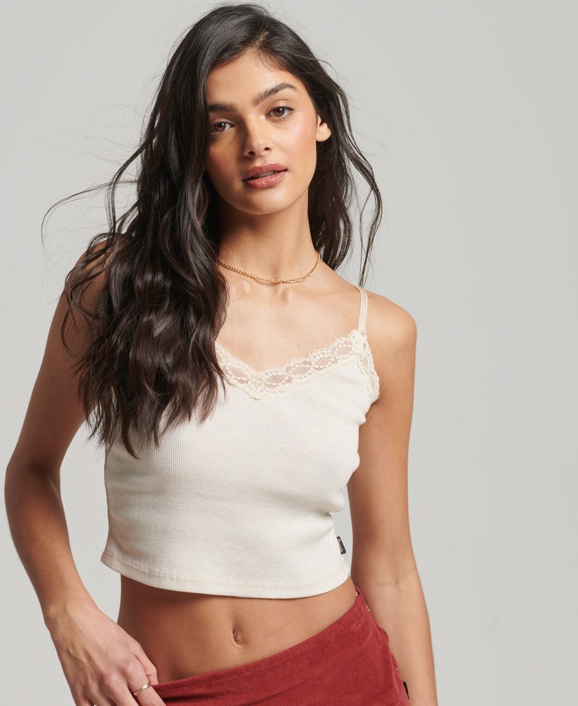 cami top met ribkantafwerking in havermoutkleur.