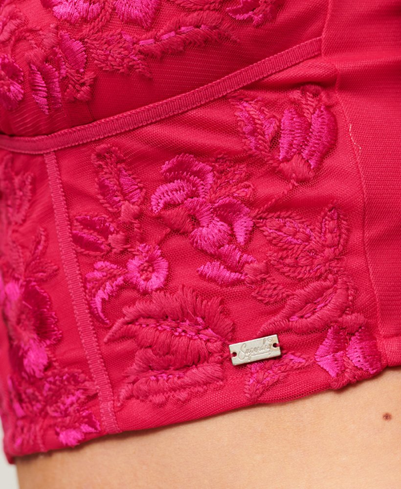 korsettop met bloemenborduurwerk in fuchsia roze