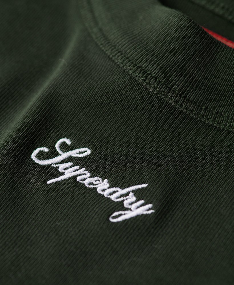 geribbelde crop top met lange mouwen en borduurwerk in donkergroen academy dark green