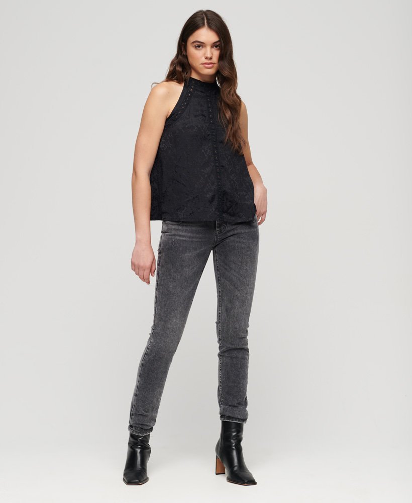 mouwloze top met hoge hals van kant in urban zwart