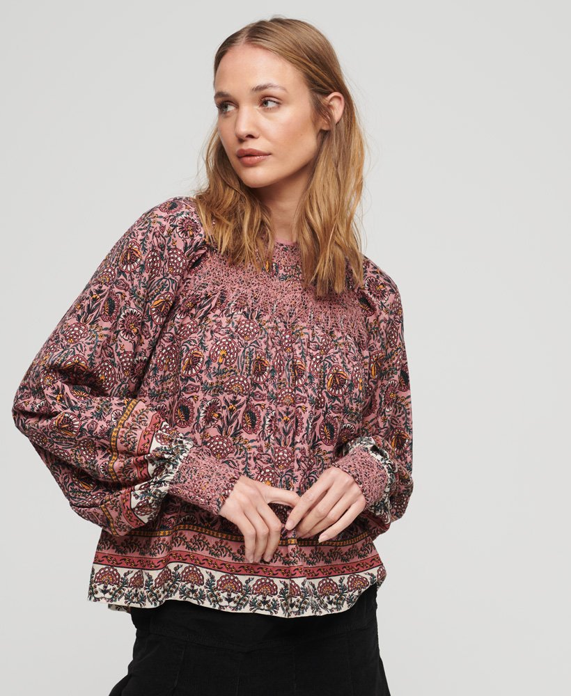 bedrukte top met gerimpelde details in perzikkleurige franse bloemenprint.