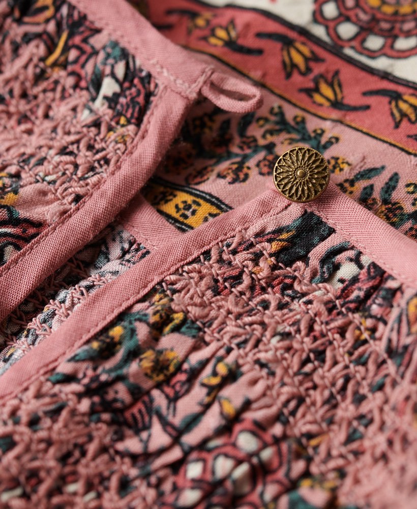 bedrukte top met gerimpelde details in perzikkleurige franse bloemenprint.