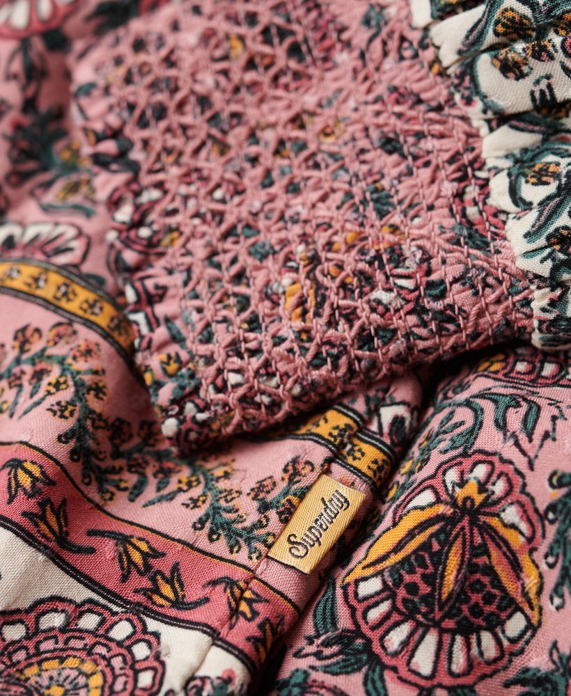 bedrukte top met gerimpelde details in perzikkleurige franse bloemenprint.