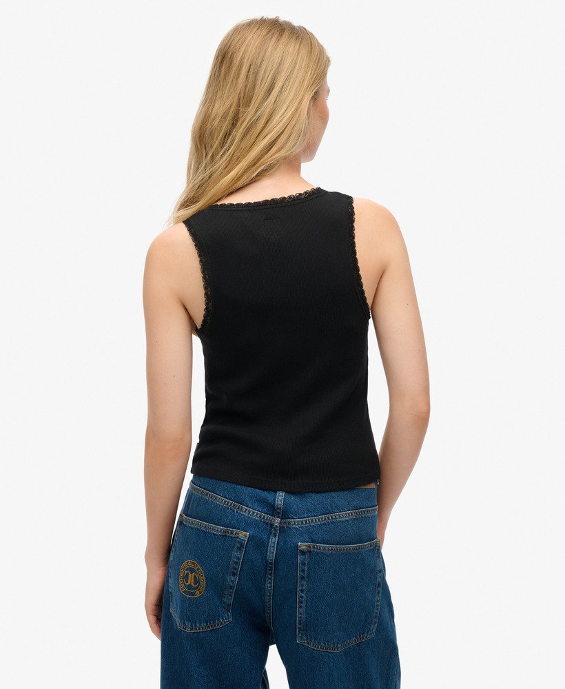 vintage vestje met kanten afwerking van athletic essentials in zwart.