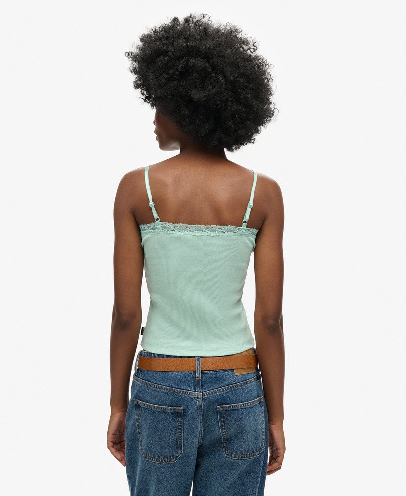 vintage cami top van biologisch katoen met ribboord en kanten afwerking in mintgroen gemêleerd.