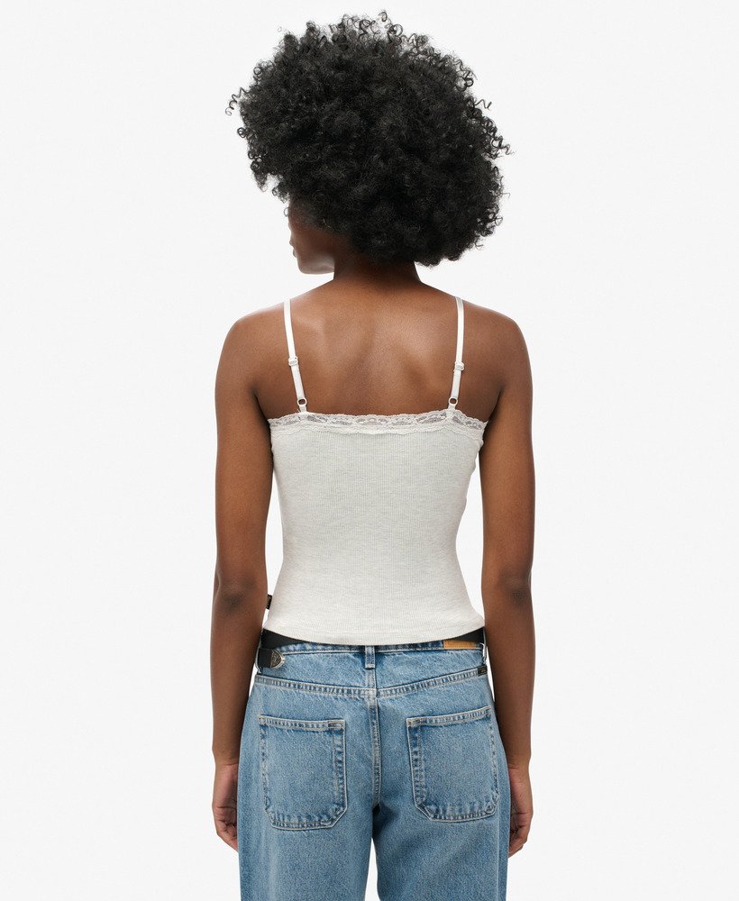 athletic essential cami top met kanten afwerking in licht gemêleerd ijs.