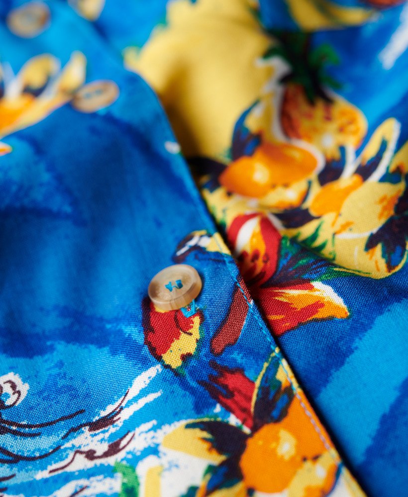 strandresort shirt in blauw met dolfijnmotief in de oceaan.
