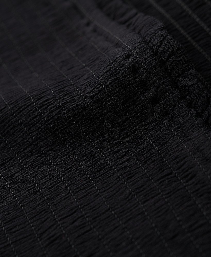 bandeau-top met smokwerk in zwart