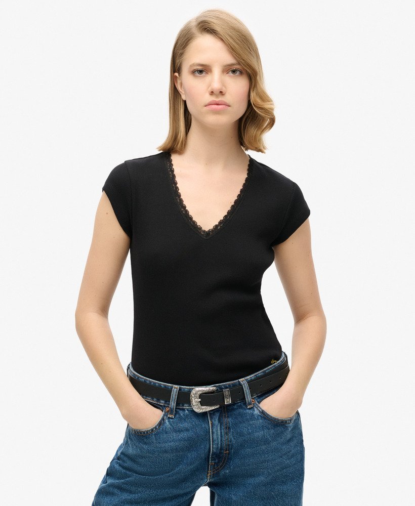 athletic essentials top met v-hals en kanten afwerking in zwart