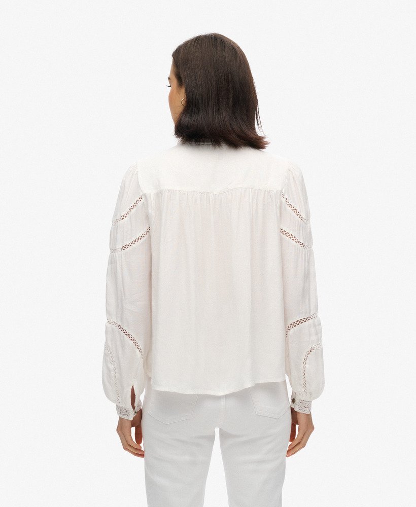 blouse met lange mouwen van geweven kant in gebroken wit.
