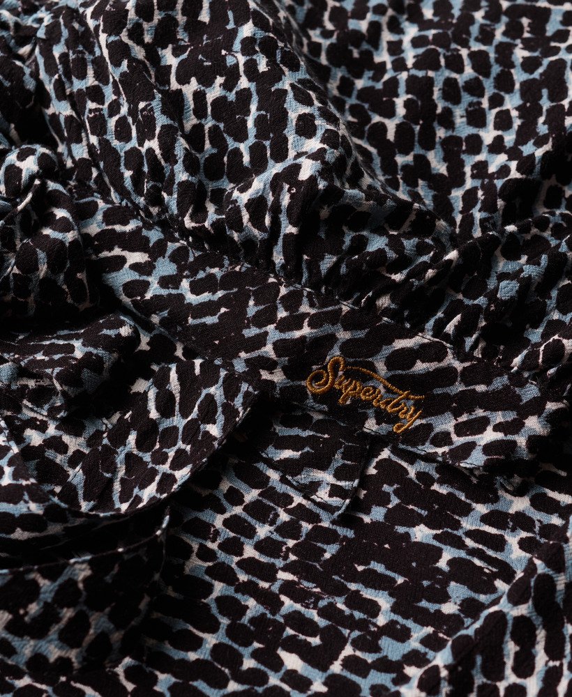 vintage top met strik aan de voorkant in regenmotief mono