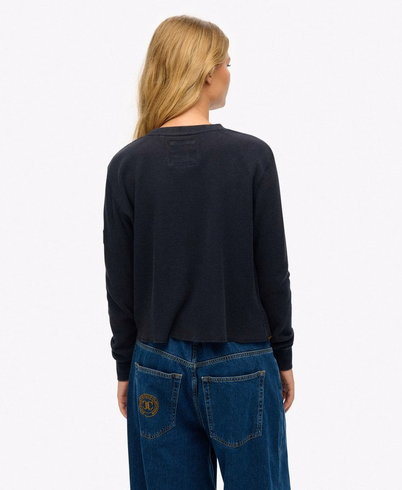Essentiële sportieve top met lange mouwen en grafische print