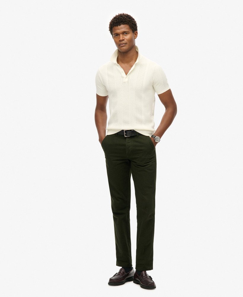 gebreid poloshirt met korte mouwen in gebroken wit.