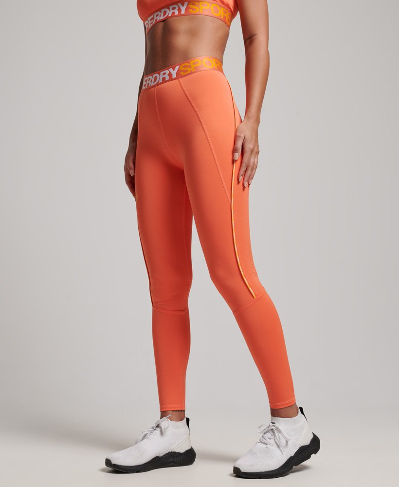 train branded elastische strakke legging in cali coral