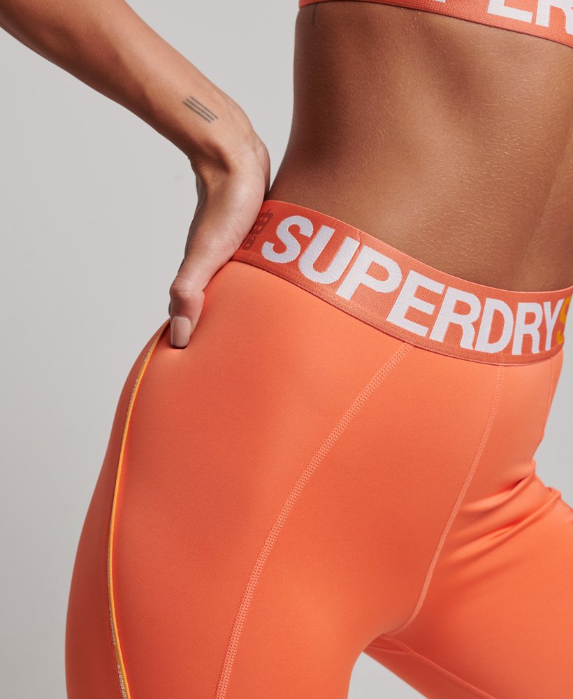 train branded elastische strakke legging in cali coral