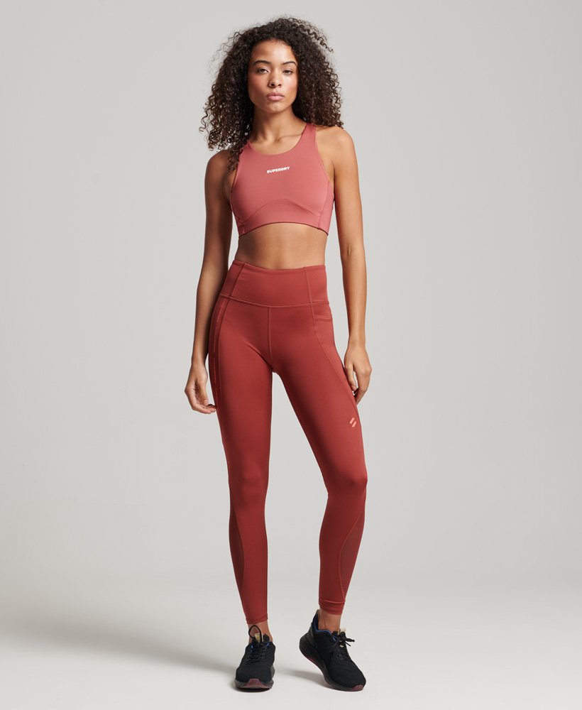 nauwsluitende legging van active mesh in de kleur fired brick brown.