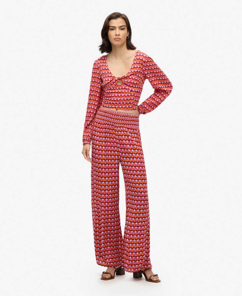 strandbroek in geometrisch roze uit de jaren 70