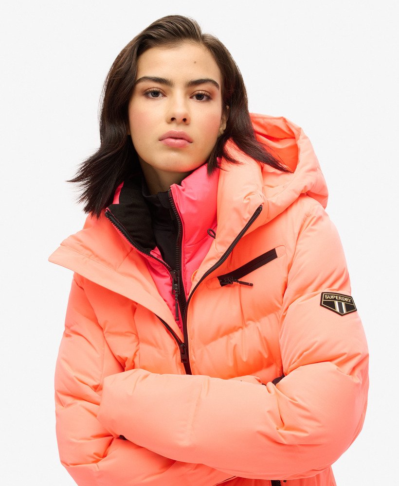 ski luxe pufferjack in pastelline coral